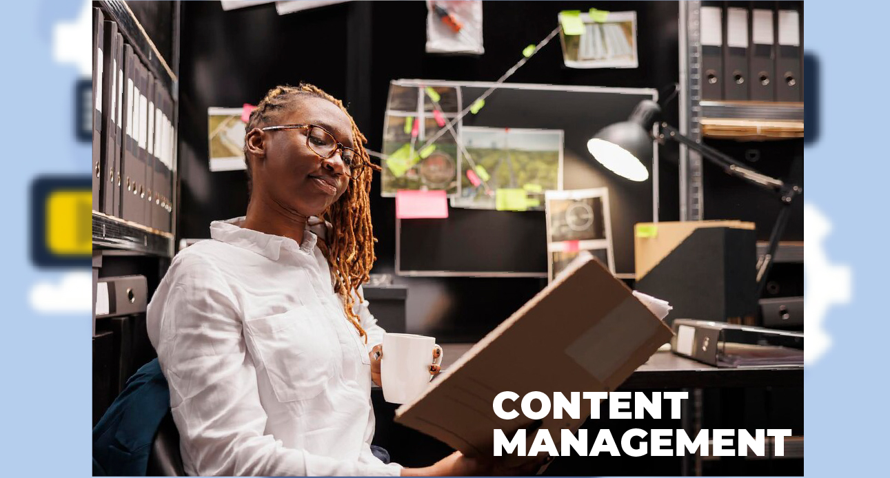 Team managing digital content on multiple devices including laptop and tablet
